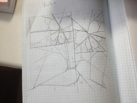 Sketching designs old school style.