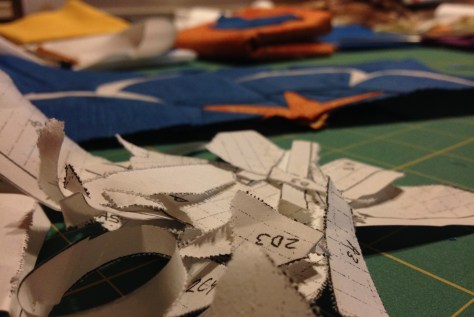 Tearing away the bits of paper after piecing a block very well may be my favorite part of paper piecing....