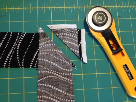 Using my favorite straight-grain binding tutorial.