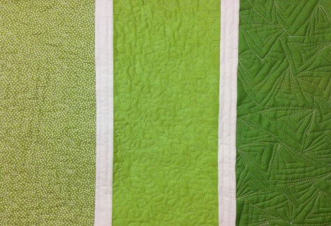 Blocky baby quilt. To see more of my recently attempted free motion quilting patterns, see my post A Sensory Adventure with FMQ