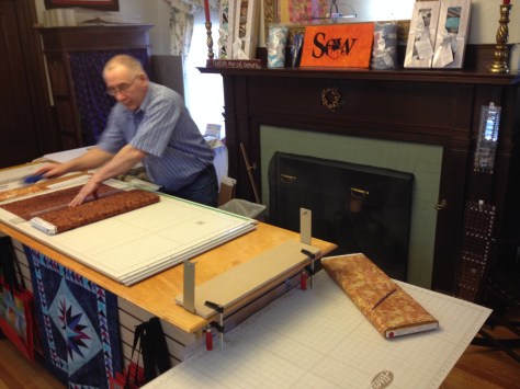 The cutting table is right in front of the mantle and fireplace!