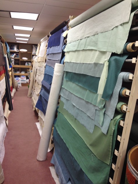The lowest level was filled with large rolls of batting and rows of upholstery fabric.