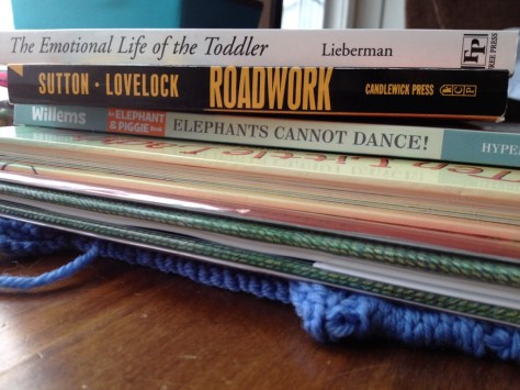 As flattened as this sweater looks under this stack, the method did not actually work all that well.