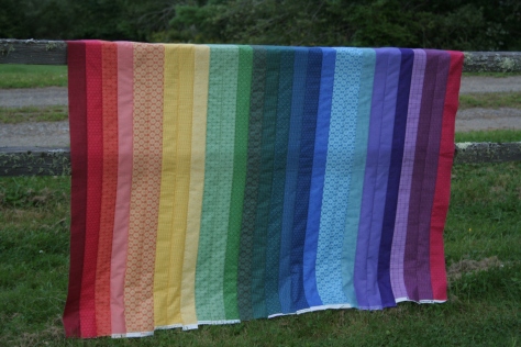 shaded rainbow jellyroll quilt