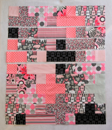 pink and gray baby plus quilt
