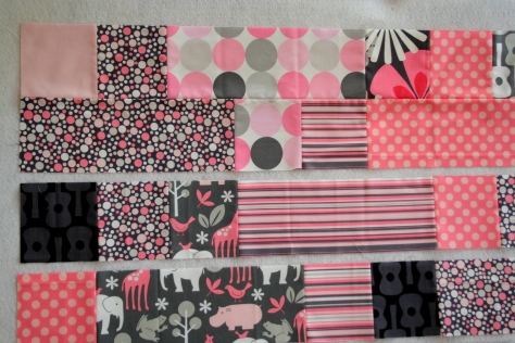 pink and grey baby plus quilt