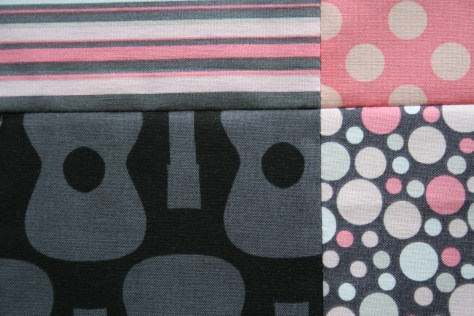 pink and grey baby plus quilt top finish