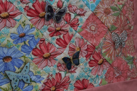 butterfly pins on garden quilt