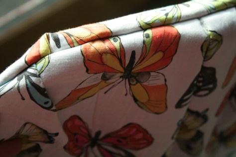 Extra impromptu pleats on back pocket.