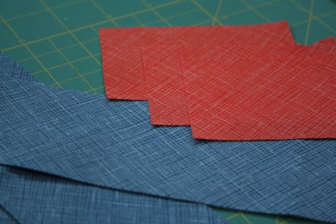 architextures fabric in cadet and poppy