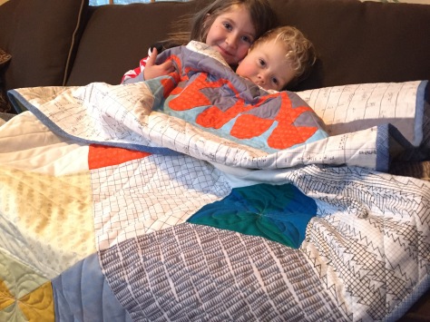 snuggling in the finished quilt