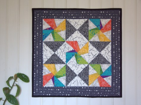 twirling star mini quilt finish
