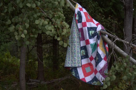 welded quilt in a tree