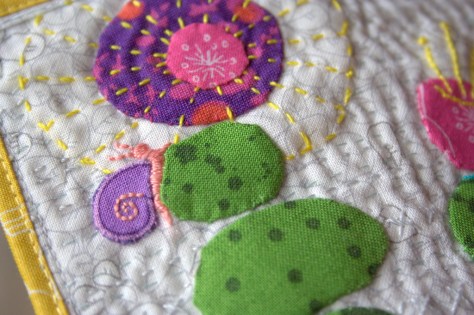 slow growth mini mini quilt finish snail detail