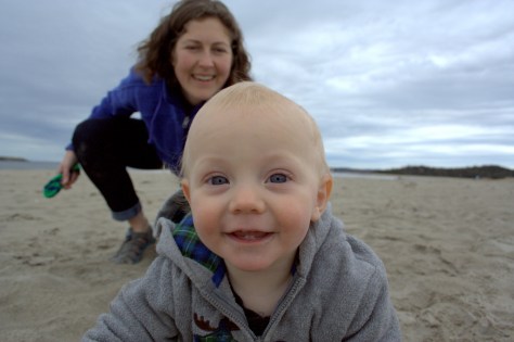 baby crawling on beach
