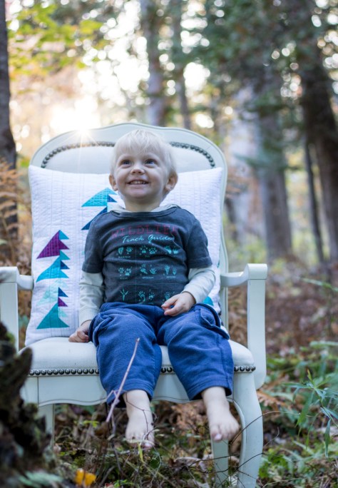 2 year old pillow photo shoot helper