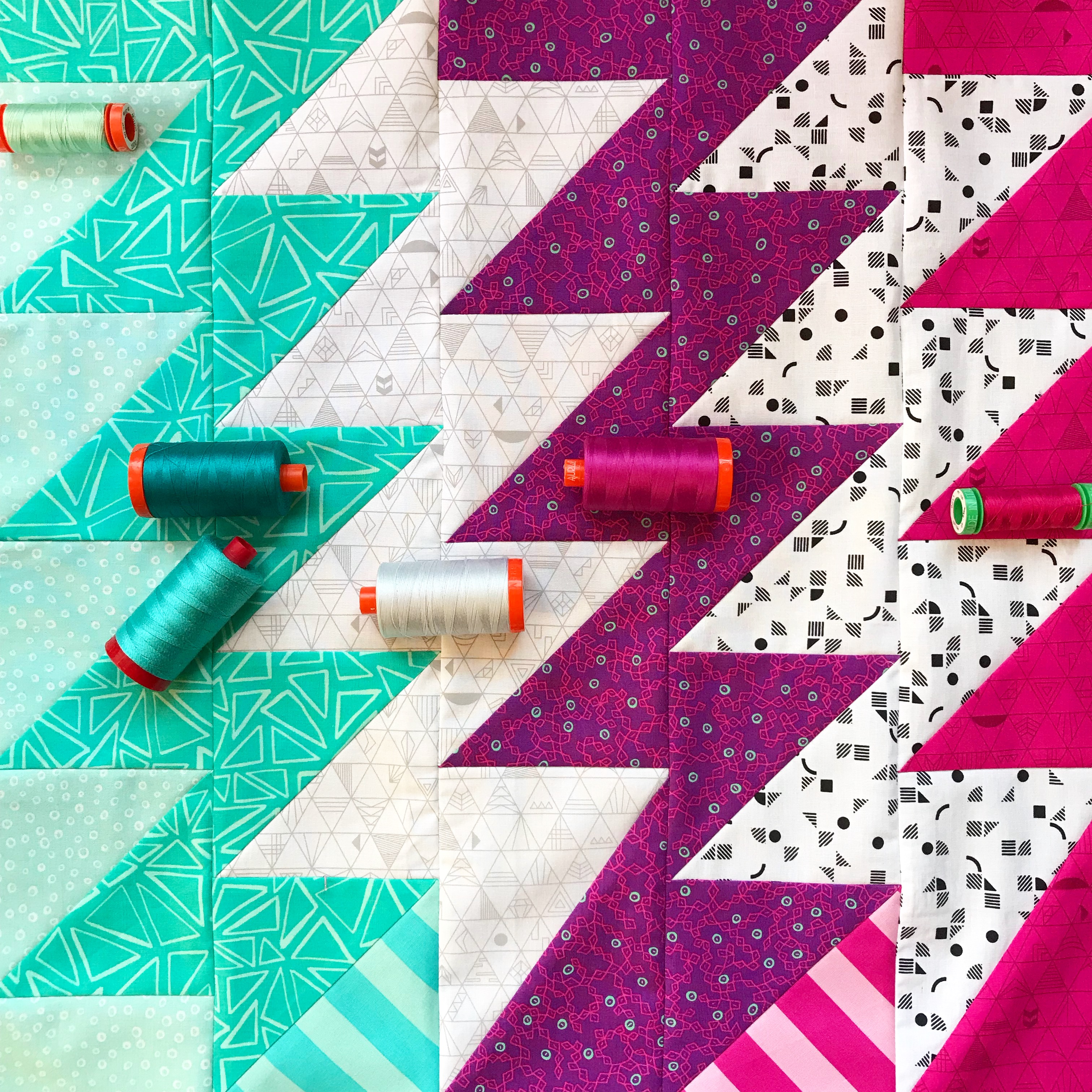 superbolt mini quilt top with aurifil threads