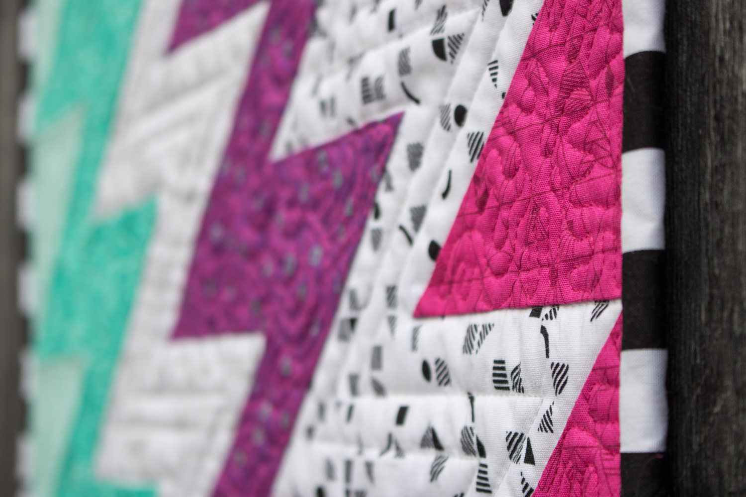 quilting detail and striped binding aurifil superbolt panache fabric